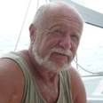 A picture containing person, outdoor, man, animal

Description automatically generated