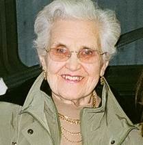 A person smiling for the camera

Description automatically generated