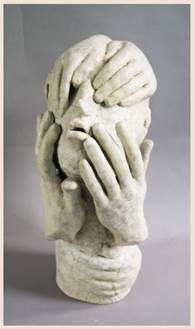 A picture containing sculpture, handwear, stone

Description automatically generated