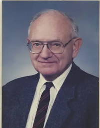 An old person in a suit and tie

AI-generated content may be incorrect.