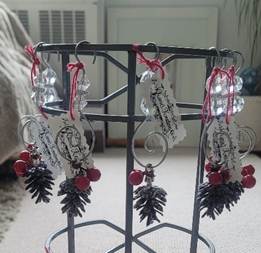 A metal stand with ornaments
AI-generated content may be incorrect.